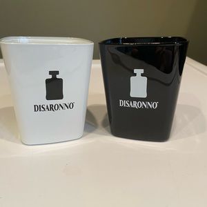 Set of two black and white cordial glasses by Disaronno.